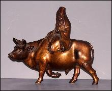 Oriental Bronze Bull and Man