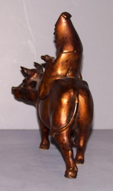 Oriental Bronze Bull and Man