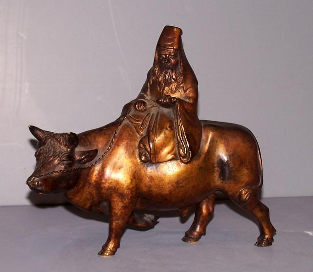 Oriental Bronze Bull and Man