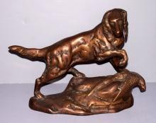 Bronze dog with pheasant Statue