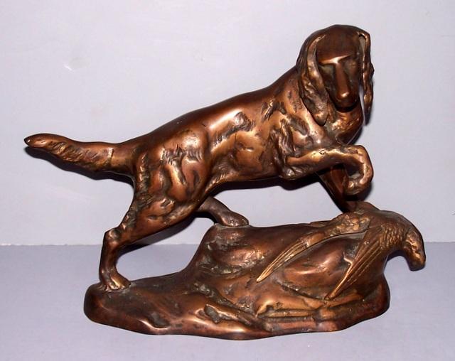 Bronze dog with pheasant Statue