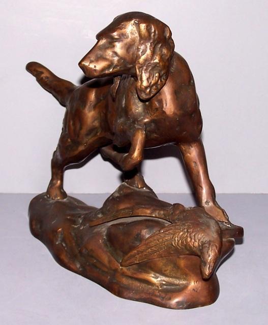 Bronze dog with pheasant Statue