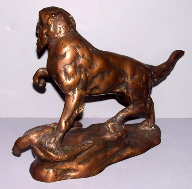 Bronze dog with pheasant Statue