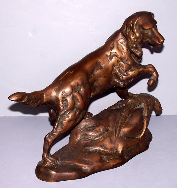 Bronze dog with pheasant Statue