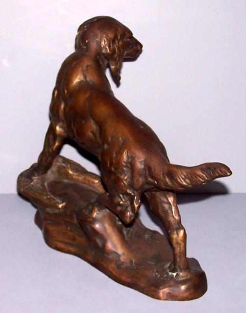 Bronze dog with pheasant Statue