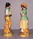 Pair of Boy and Girl Staffordshire Figurines