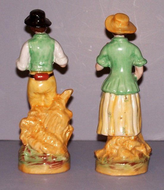 Pair of Boy and Girl Staffordshire Figurines