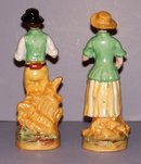 Pair of Boy and Girl Staffordshire Figurines