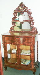 Beidemeier Mahogany glass cabinet with grape