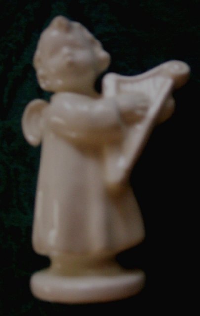 Small Angel old with germany and v with Bee