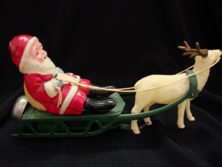Celluloid Santa on Tin Sleigh - Key wind Toy