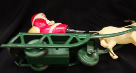 Celluloid Santa on Tin Sleigh - Key wind Toy