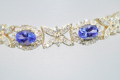 $ 8500. TANZANITE & DIAMOND 3 CARATS 18k Yellow Gold Bracelet