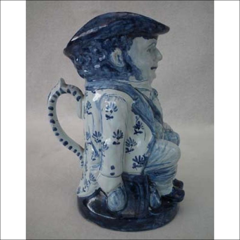 Antique Delft Blue and White Toby Jug 19th century .