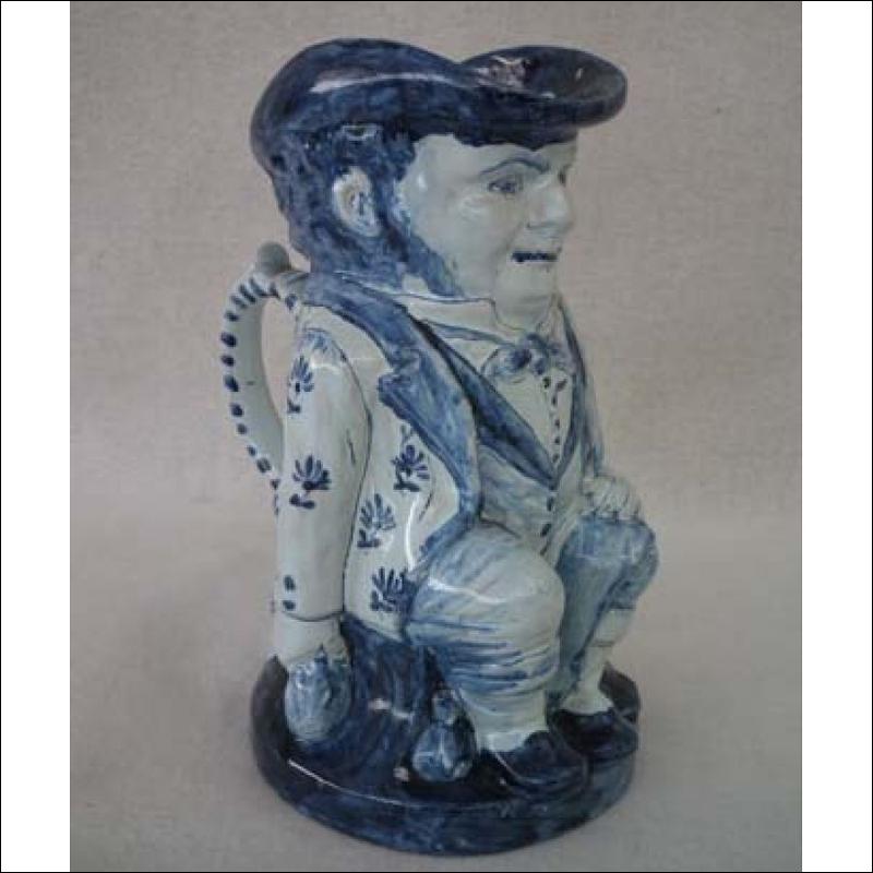 Antique Delft Blue and White Toby Jug 19th century .