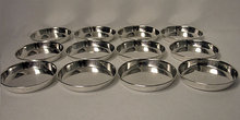 Carl Poul Petersen. Set of 12 Sterling coasters, Petersen, Montreal C.1960