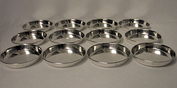Carl Poul Petersen. Set of 12 Sterling coasters, Petersen, Montreal C.1960