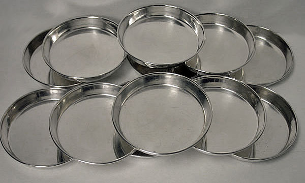 Carl Poul Petersen. Set of 12 Sterling coasters, Petersen, Montreal C.1960