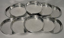 Carl Poul Petersen. Set of 12 Sterling coasters, Petersen, Montreal C.1960
