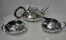 Archibald Knox Liberty Tudric pewter tea set, C.1905.