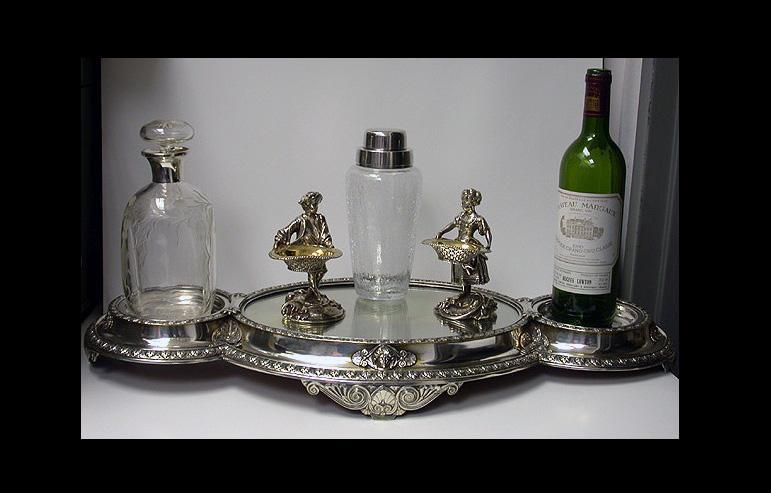 Elkington centerpiece mirror plateau bottle stand, England 1869.