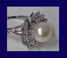 18K Pearl and Diamond cluster Ring.