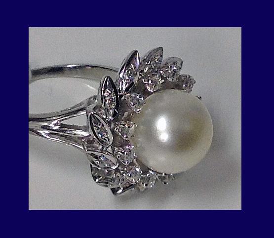 18K Pearl and Diamond cluster Ring.