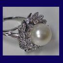 18K Pearl and Diamond cluster Ring.