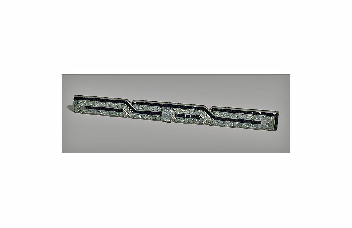 J. E. Caldwell Diamond, Onyx Platinum Bar Brooch, American, C.1930.