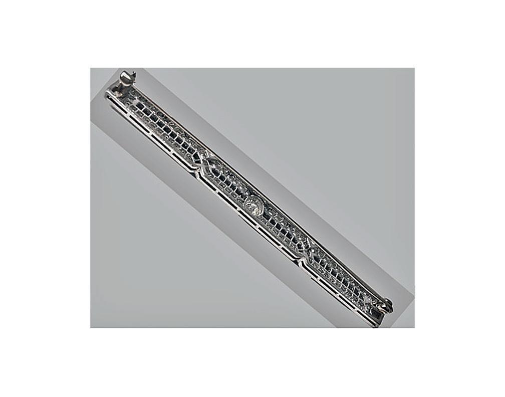 J. E. Caldwell Diamond, Onyx Platinum Bar Brooch, American, C.1930.