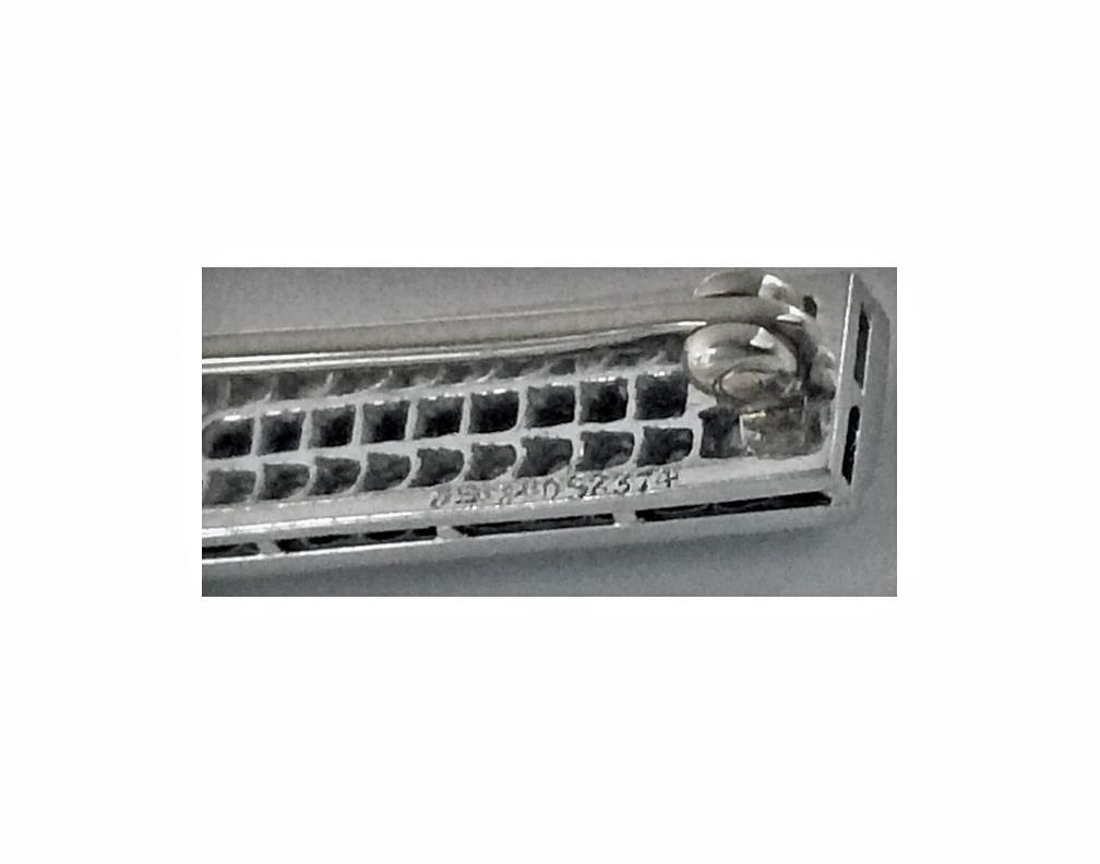 J. E. Caldwell Diamond, Onyx Platinum Bar Brooch, American, C.1930.