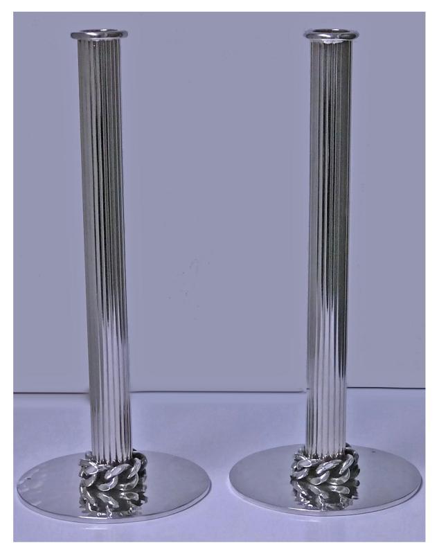 Jean Després pair of silvered metal candlesticks, Signed. C.1950