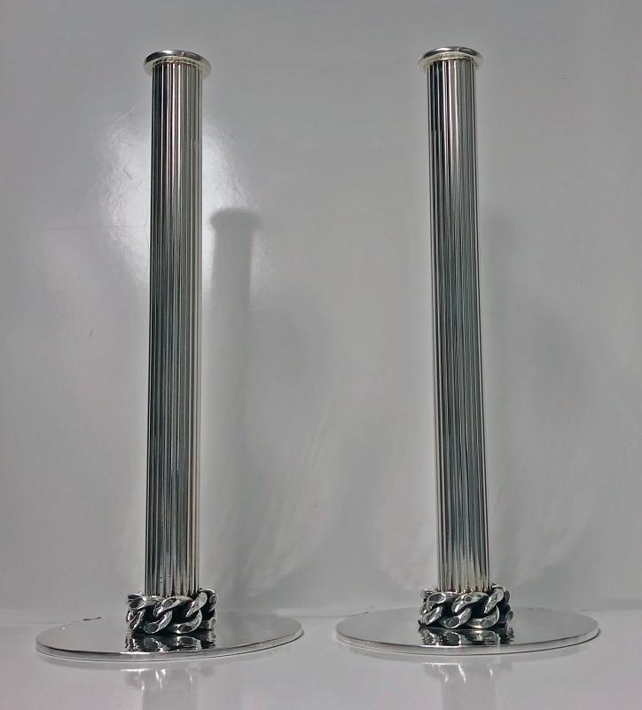 Jean Després pair of silvered metal candlesticks, Signed. C.1950