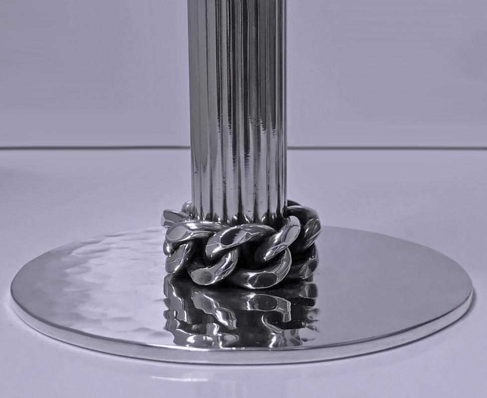 Jean Després pair of silvered metal candlesticks, Signed. C.1950