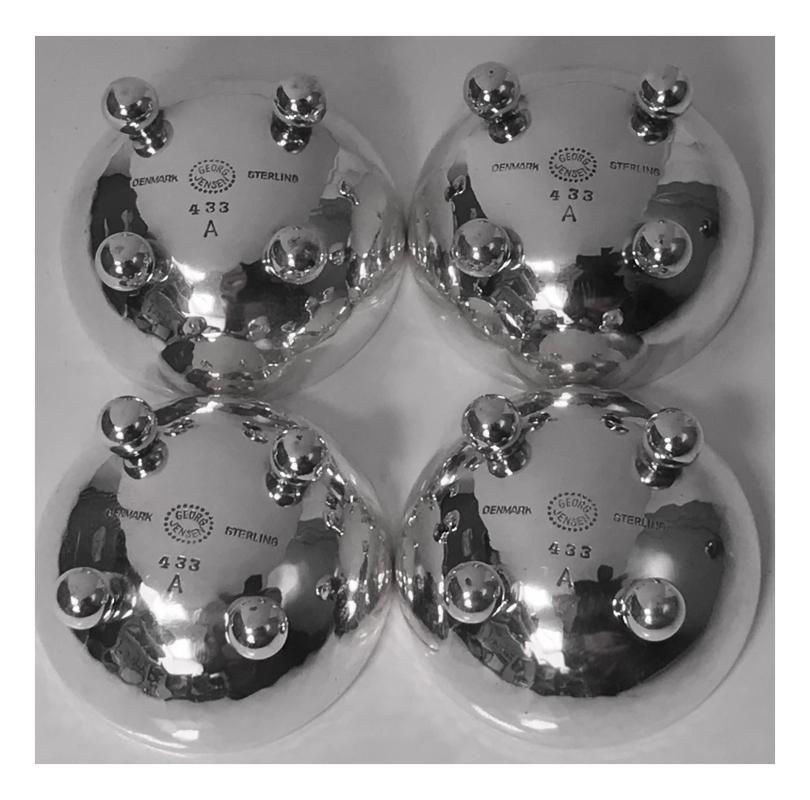 Four Georg Jensen Sterling Silver Salts with cobalt enamel interiors C.1960