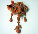 Large carved coral drop brooch, C.1850.