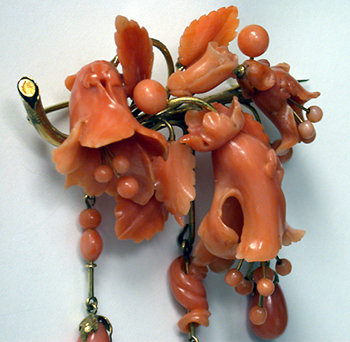 Large carved coral drop brooch, C.1850.