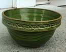 GREEN GLAZED OVER YELLOWWARE BOWL