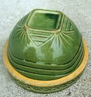 GREEN GLAZED OVER YELLOWWARE BOWL