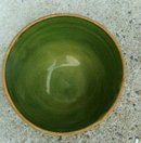 GREEN GLAZED OVER YELLOWWARE BOWL