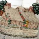 PAINTED COTTAGE DOORSTOP