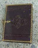 LITTLE GIRL AMBROTYPE IN LEATHERETTE CASE