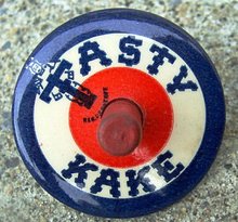 TASTY KAKE ADVERTISING CELLULOID SPINNER
