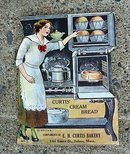 CURTIS BAKERY SEWING KIT-WOMAN AND STOVE IMAGE