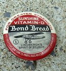 BOND BREAD LINDBERGH'S SPIRIT OF ST. LOUIS ADVERTISING CELLULOID PINBACK-PLANE IMAGE