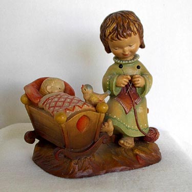 Anri Rock-A-Bye carved wooden figure by Juan Ferrandiz