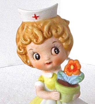 Josef Originals Red Cross Nurse With Flower