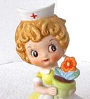 Josef Originals Red Cross Nurse With Flower