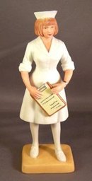Enesco White Cap Nurse with Clip Board