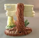 Older Aquarium Ornament Mermaid and Topless Beach Sign